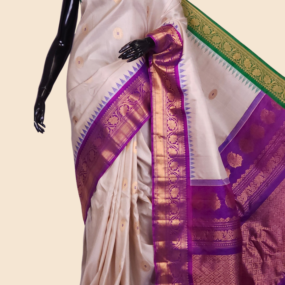 Handloom Gadwal pure silk saree with zari woven motifs
