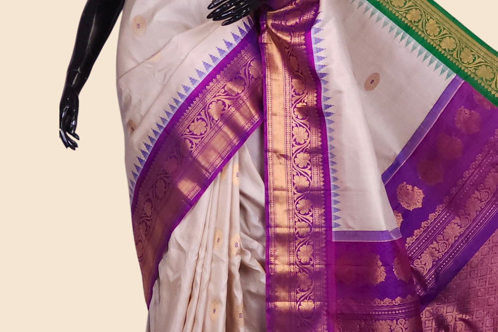 Handloom Gadwal pure silk saree with zari woven motifs
