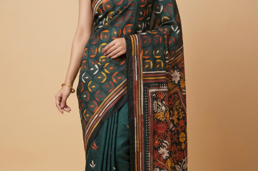 Semi Bangalore silk saree with all-over hand Kantha work and rich embroidered pallu.
