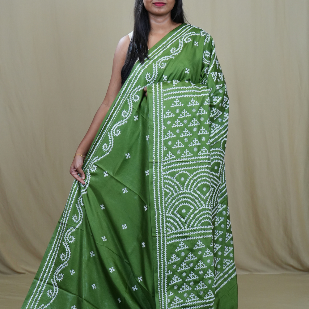 Semi Bangalore Silk Saree with all-over Kutch work motifs and rich embroidered pallu.
