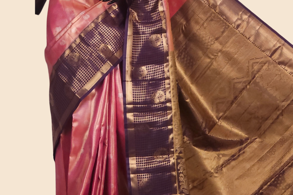 Semi Kanjeevaram silk saree with allover zari checks and motifs and contrast zari border
