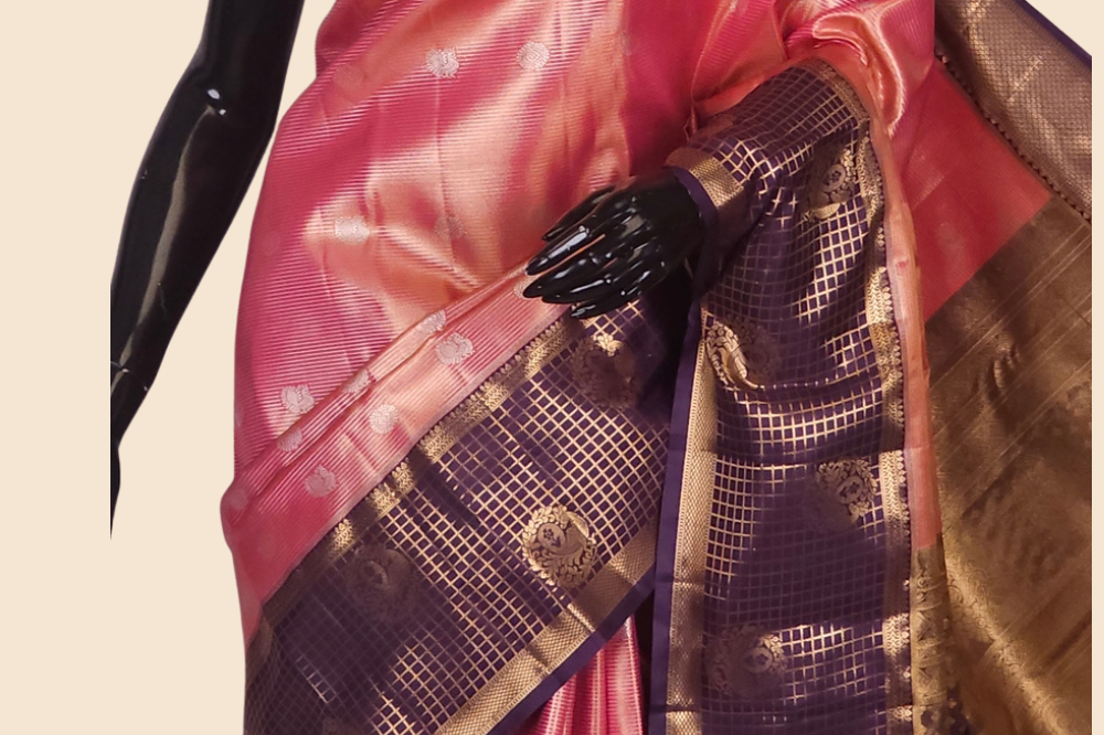 Traditional semi Kanjeevaram saree featuring rich brocade pallu and contrast blouse

