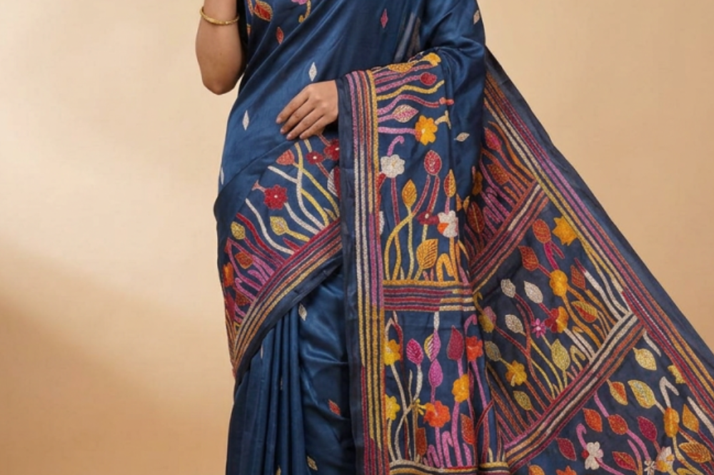 Semi Bangalore silk saree with all-over hand Kantha work and rich embroidered pallu.
