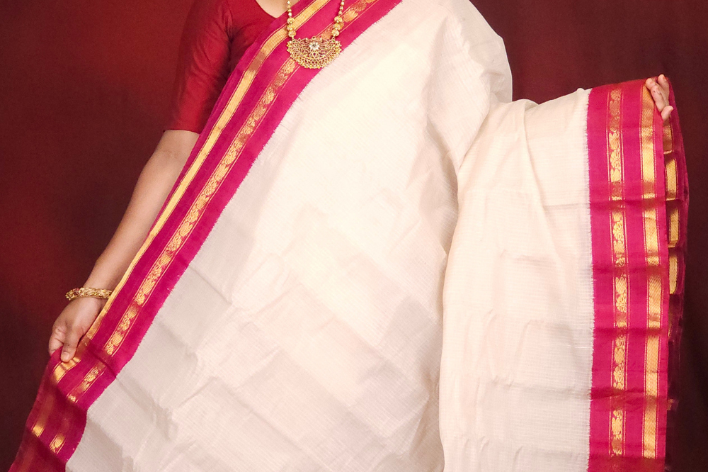 Lightweight Gadwal cotton saree featuring elegant zari border and striped pallu design.
