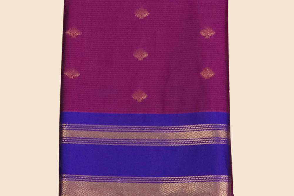 Handloom semi Gadwal saree featuring rich brocade pallu and contrast blouse
