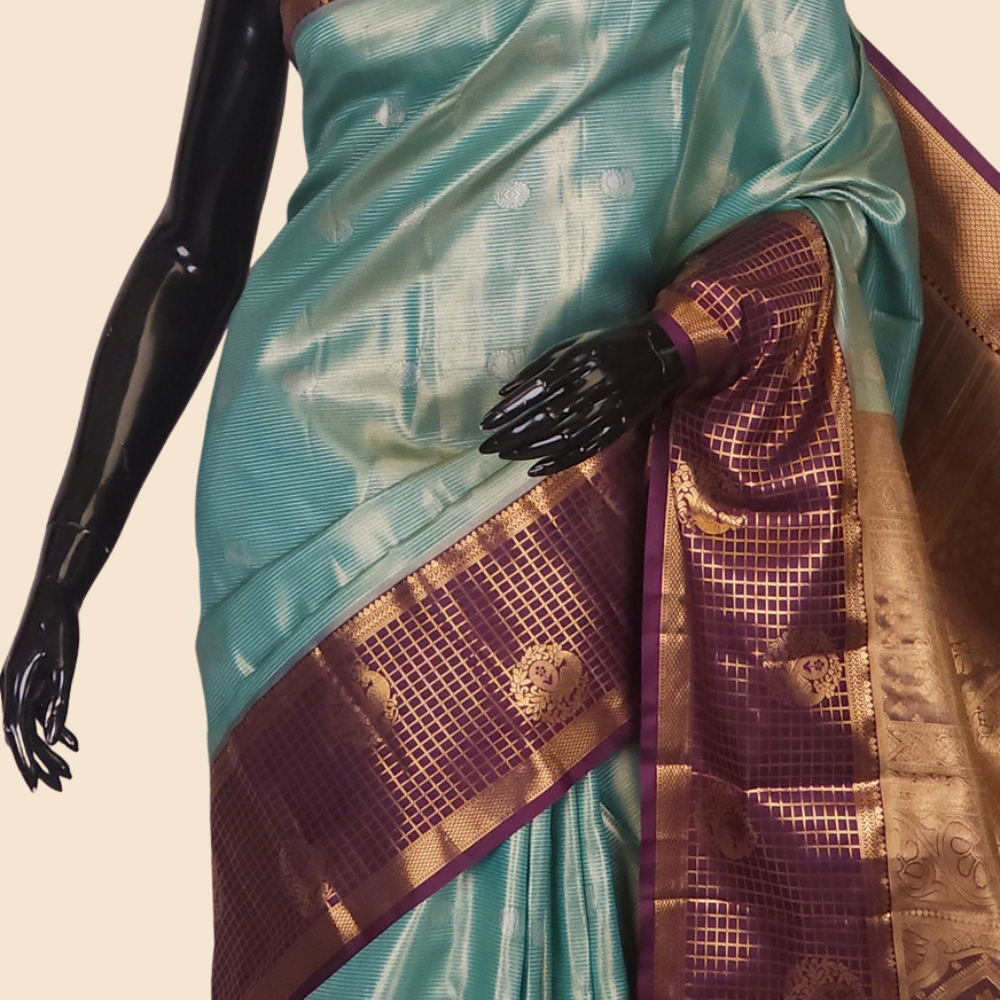 Traditional semi Kanjeevaram saree featuring rich brocade pallu and contrast blouse
