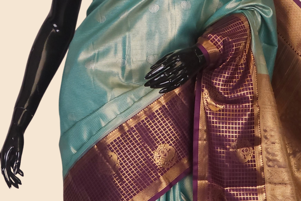 Traditional semi Kanjeevaram saree featuring rich brocade pallu and contrast blouse
