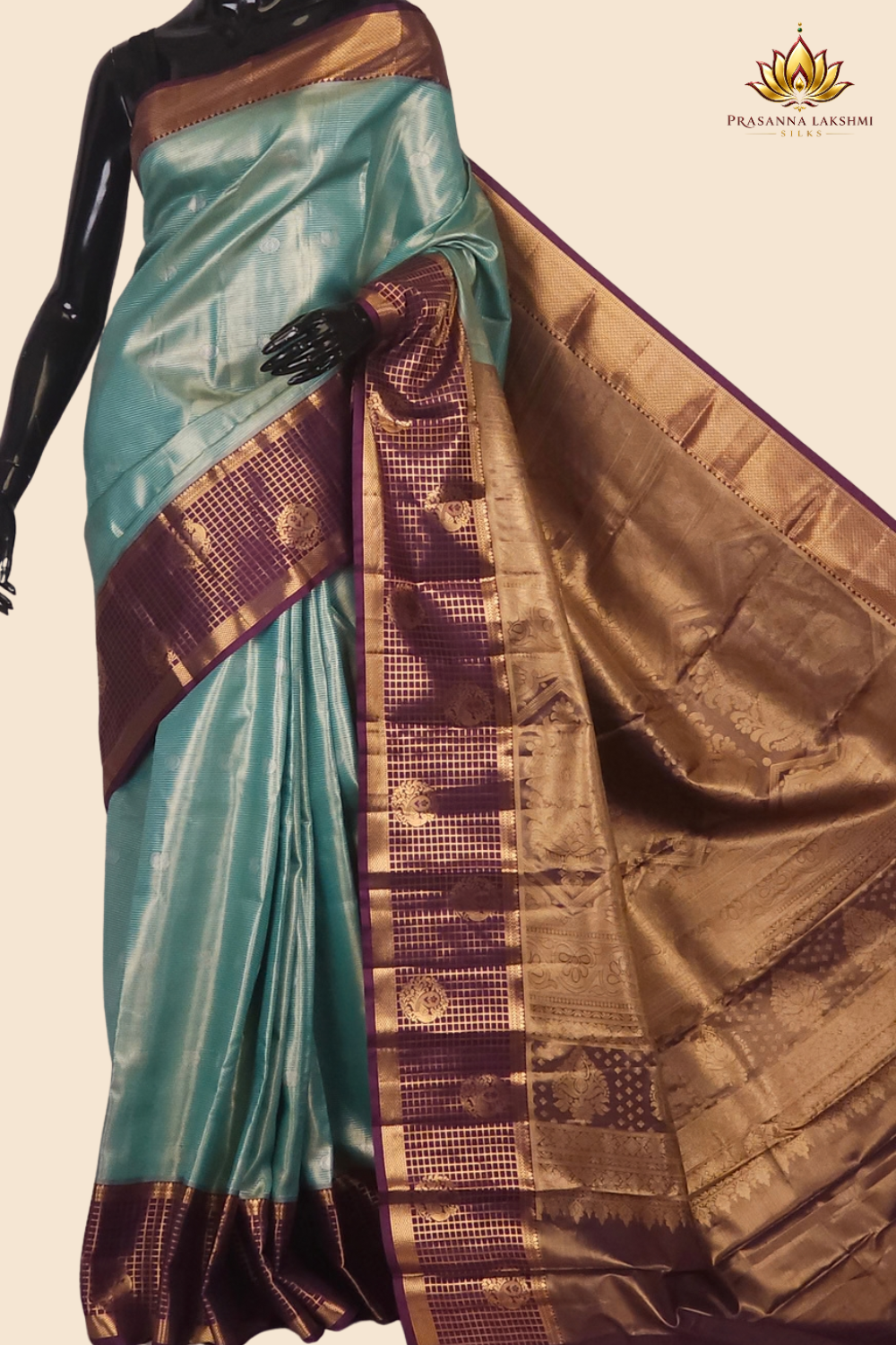 Semi Kanjeevaram silk saree with allover zari checks and motifs and contrast zari border
