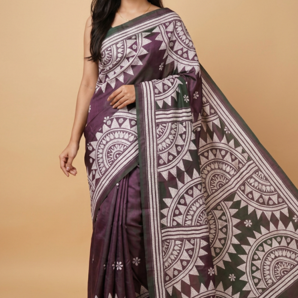 Semi Bangalore silk saree with all-over hand Kantha work and rich embroidered pallu.