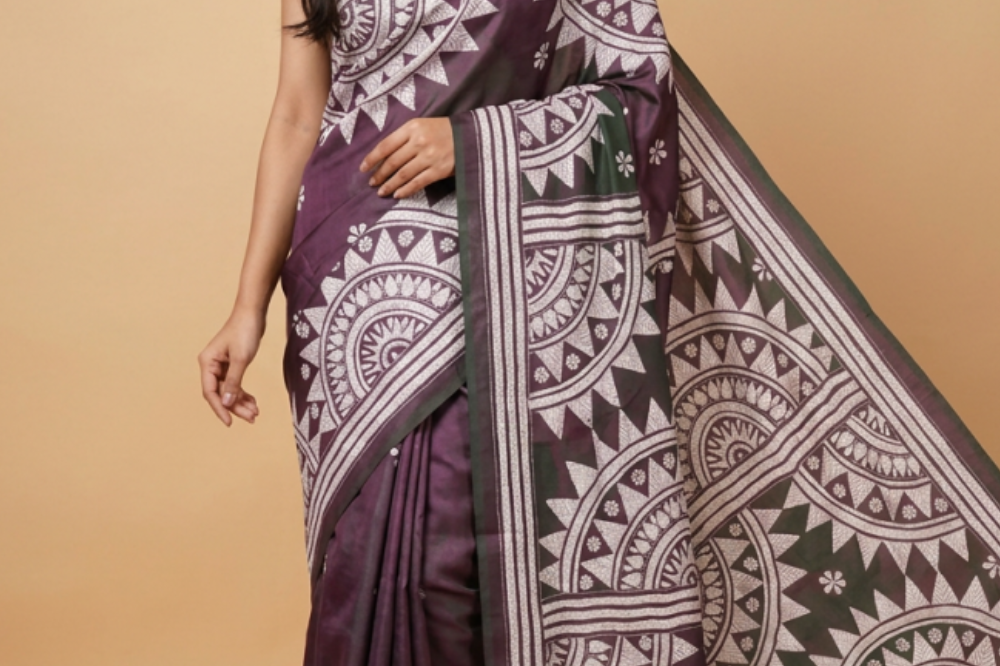 Semi Bangalore silk saree with all-over hand Kantha work and rich embroidered pallu.