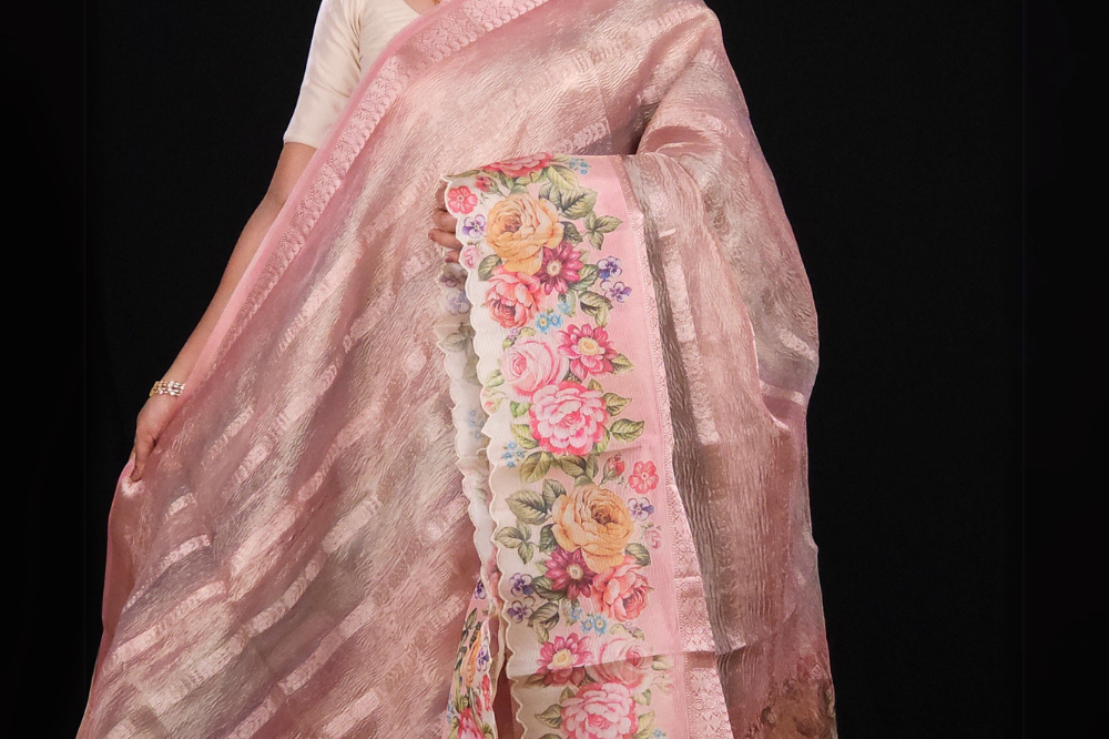 peach Crush tissue saree with allover zari lines and digital printed pallu