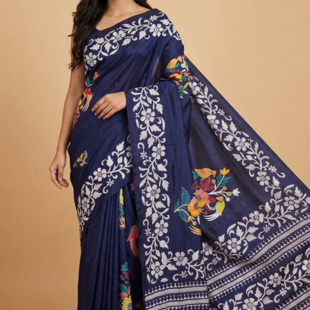 Semi Bangalore silk saree with all-over hand Kantha work and rich embroidered pallu.
