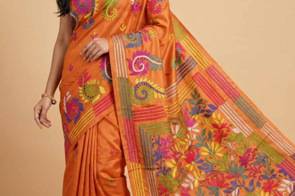 Semi Bangalore silk saree with all-over hand Kantha work and rich embroidered pallu.