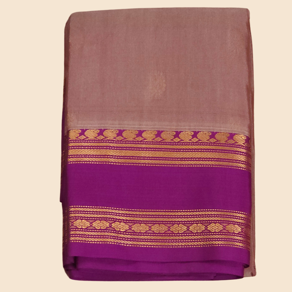 Handloom semi Gadwal saree featuring rich brocade pallu and contrast blouse
