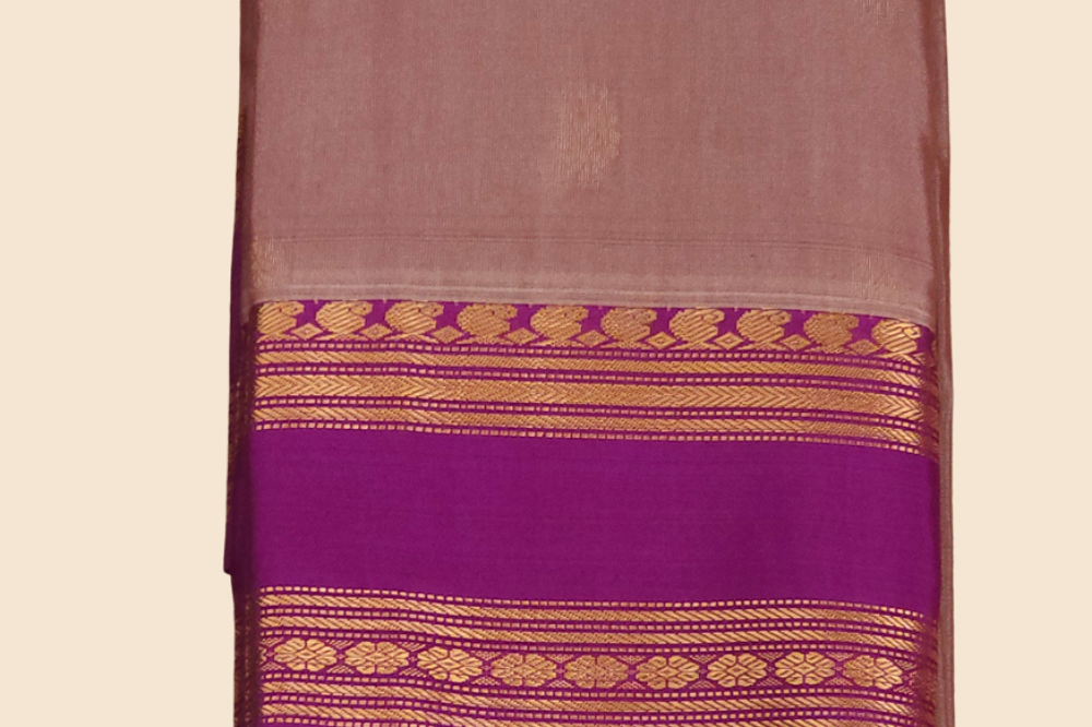 Handloom semi Gadwal saree featuring rich brocade pallu and contrast blouse
