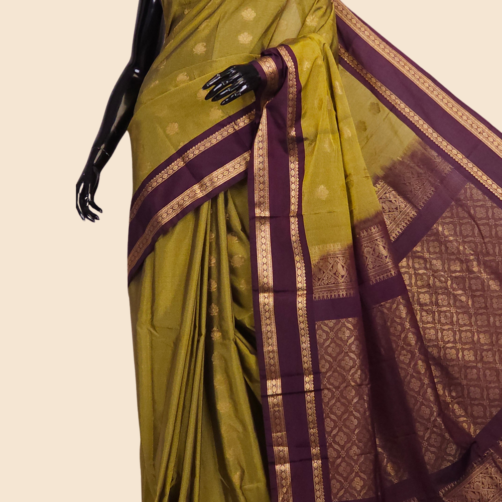 Semi Gadwal saree with horizontal zari motif stripes and zari woven gap borders
