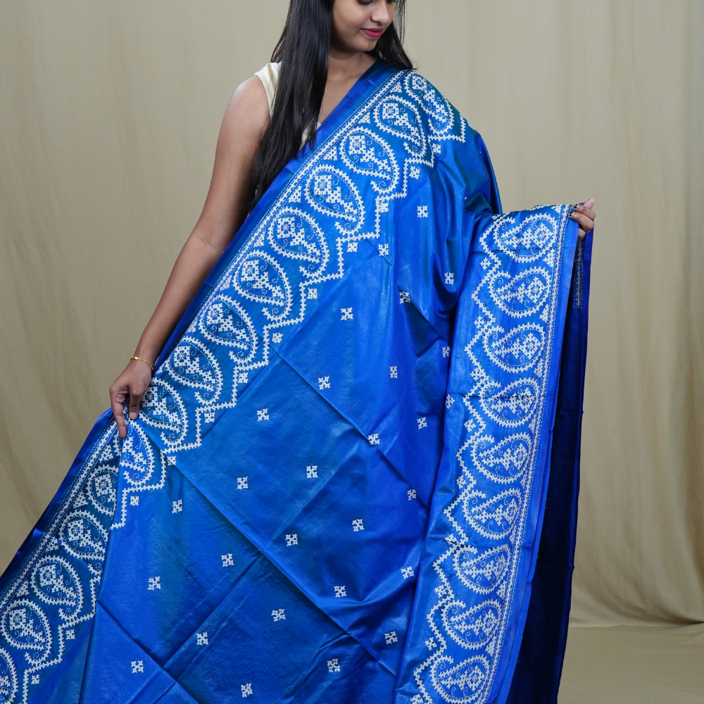 Traditional semi silk saree featuring beautiful hand Kutch work borders and artistic design.
