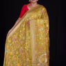 “Elegant floral organza saree with zari border”