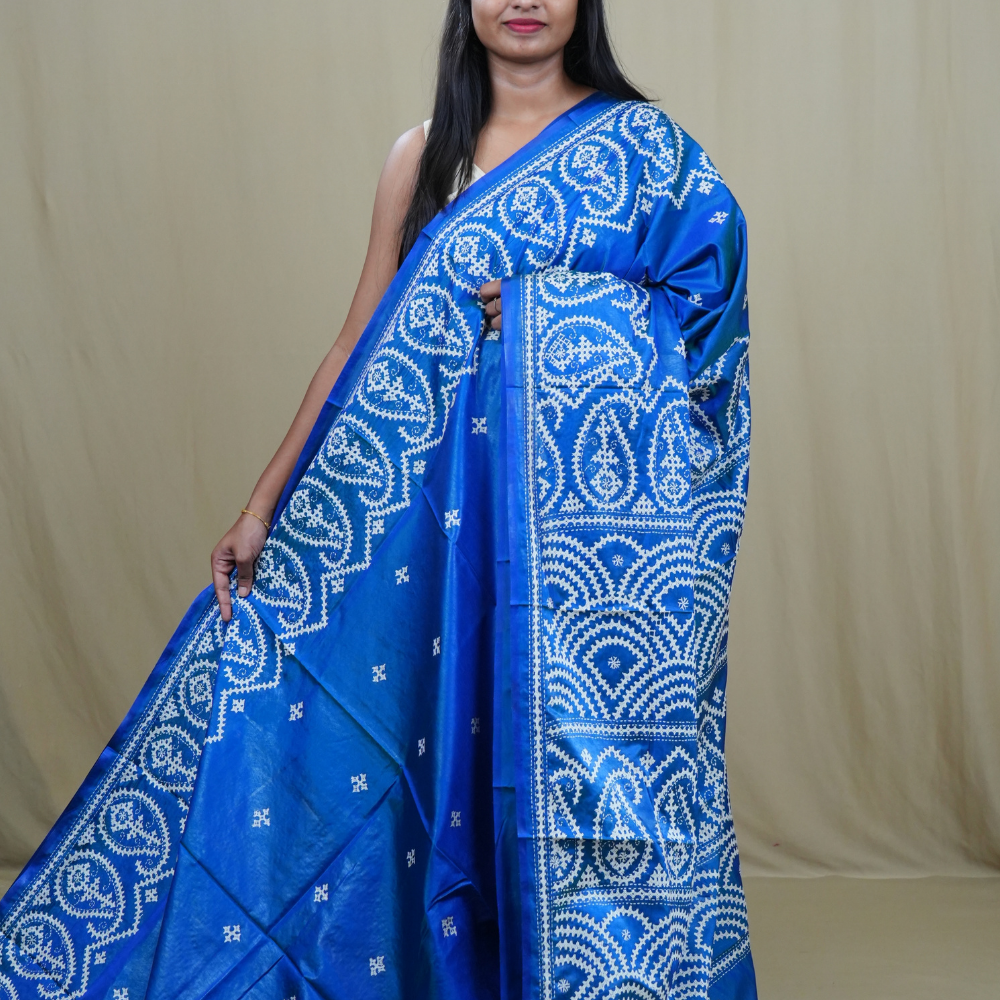 Semi Bangalore Silk Saree with all-over Kutch work motifs and rich embroidered pallu.
