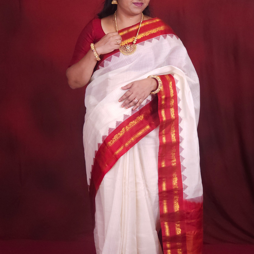 Lightweight Gadwal cotton saree featuring elegant zari border and striped pallu design.
