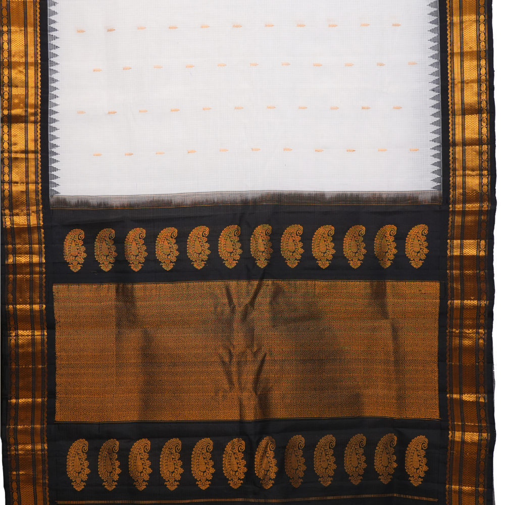 Traditional Gadwal SiCo saree featuring exquisite zari woven borders and blouse piece.
