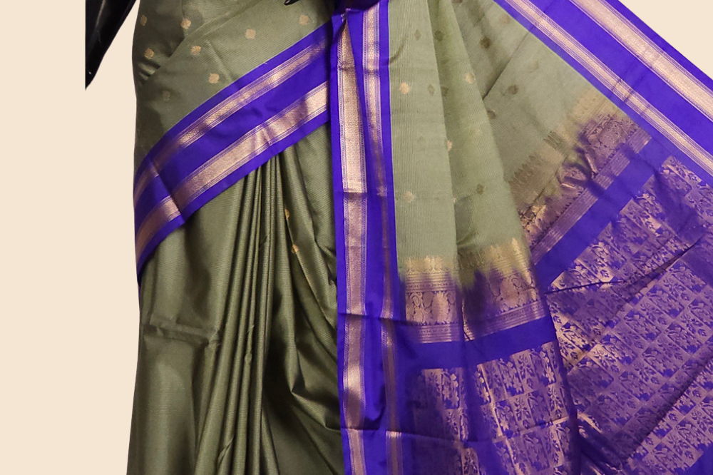 Semi Gadwal saree with horizontal zari motif stripes and zari woven gap borders

