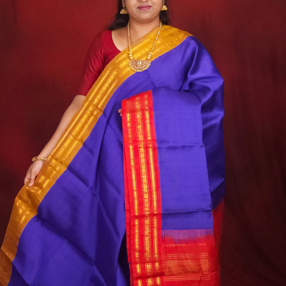 Lightweight Gadwal cotton saree featuring elegant zari border and striped pallu design.
