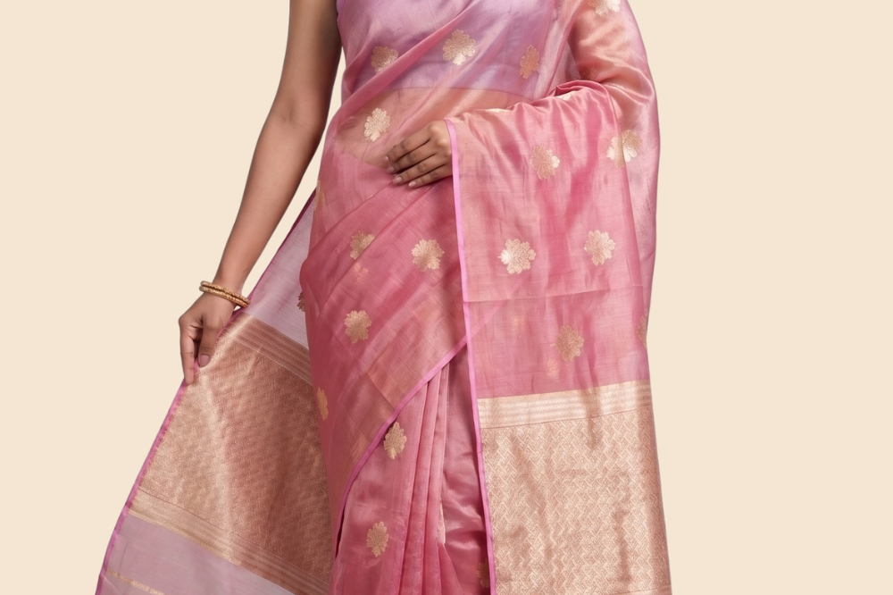 Kora tissue saree with allover gold flower motifs and silver highlights
