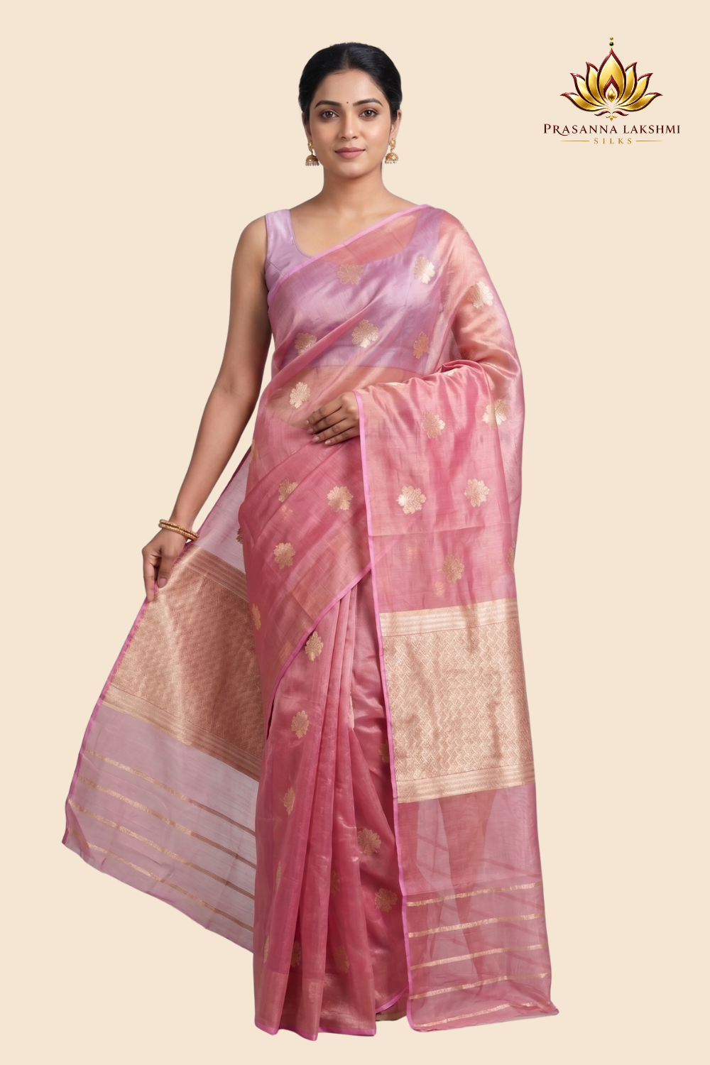 Kora tissue saree with allover gold flower motifs and silver highlights
