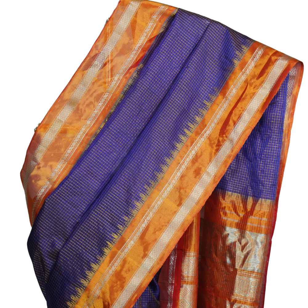 Handloom Gadwal pure tissue silk saree with intricate zari motifs and muniya borders.
