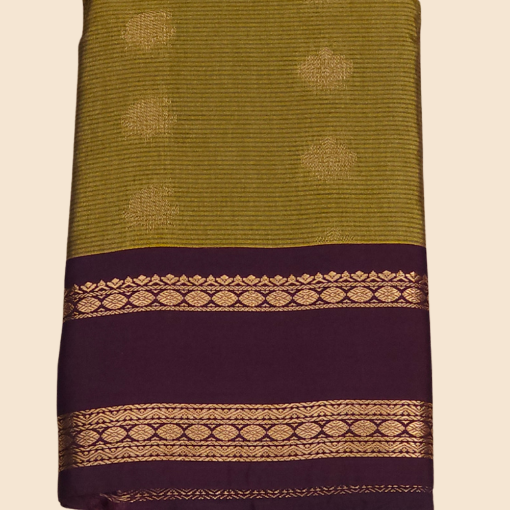 Handloom semi Gadwal saree featuring rich brocade pallu and contrast blouse
