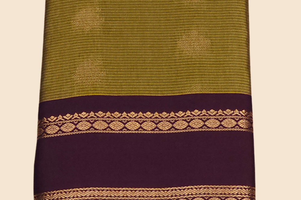Handloom semi Gadwal saree featuring rich brocade pallu and contrast blouse
