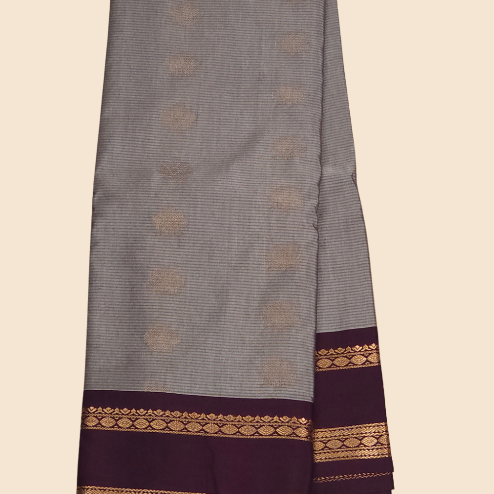 Festive semi Gadwal saree with zari stripe detailing and woven gap border finish