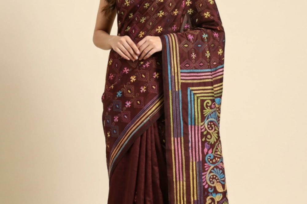 Semi Bangalore silk saree with all-over hand Kantha work and rich embroidered pallu.