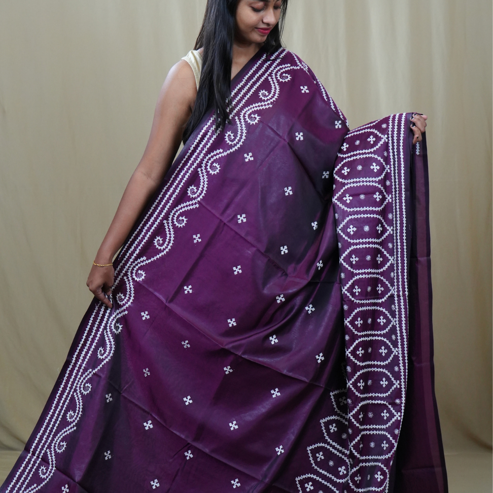 Traditional semi silk saree featuring beautiful hand Kutch work borders and artistic design.
