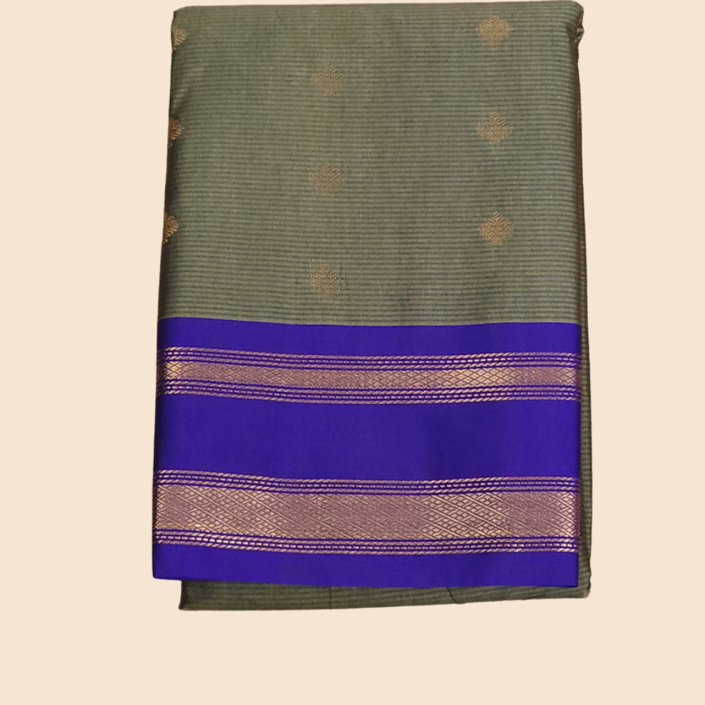 Handloom semi Gadwal saree featuring rich brocade pallu and contrast blouse
