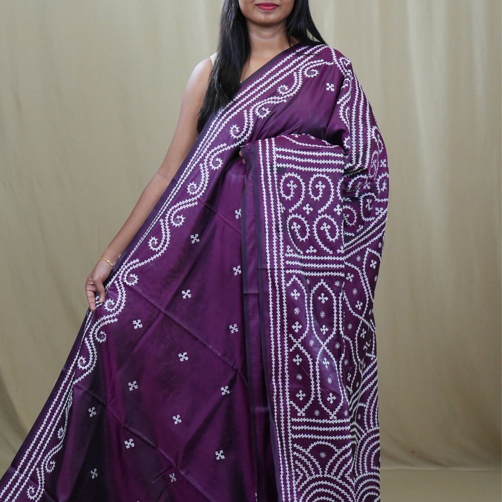Semi Bangalore Silk Saree with all-over Kutch work motifs and rich embroidered pallu.
