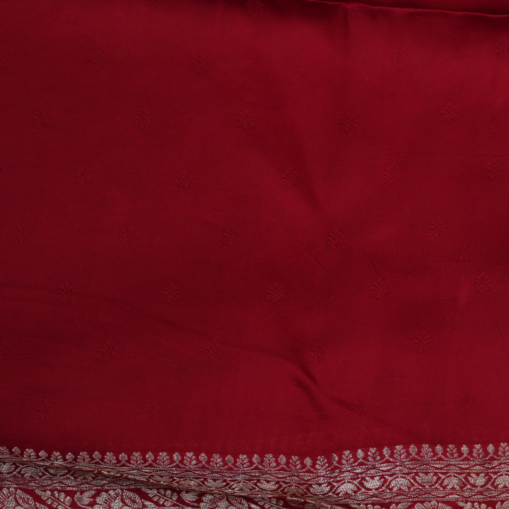 Festive Banarasi Mashru silk saree with intricate zari detailing and contrast blouse
