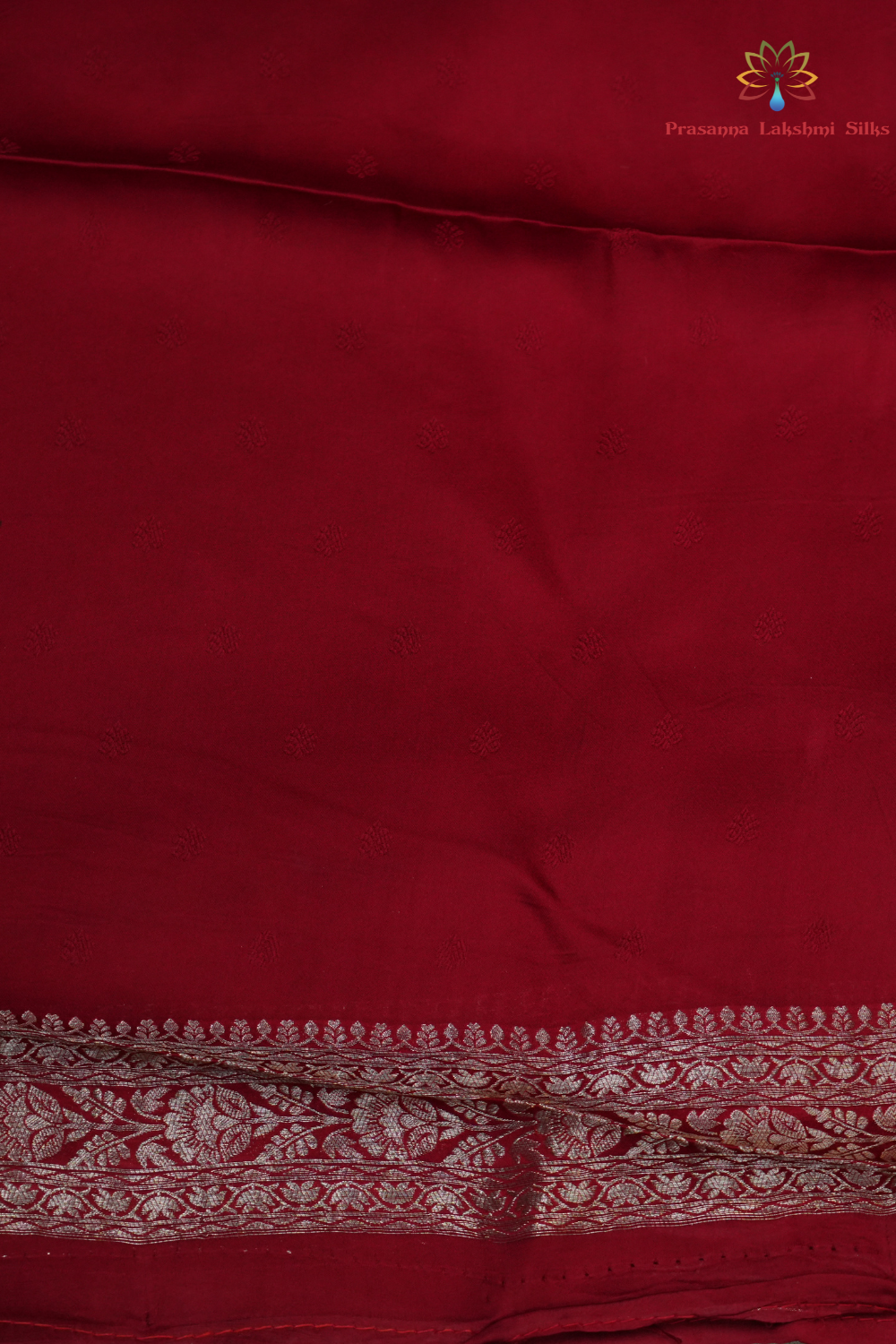 Festive Banarasi Mashru silk saree with intricate zari detailing and contrast blouse
