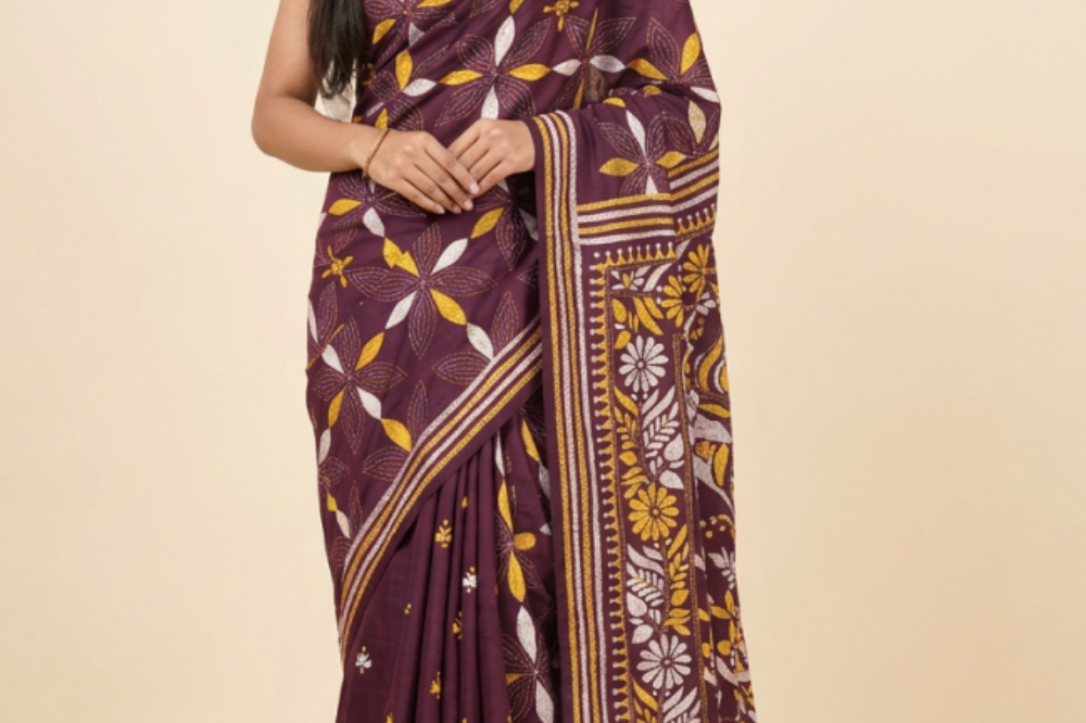 Semi Bangalore silk saree with all-over hand Kantha work and rich embroidered pallu.
