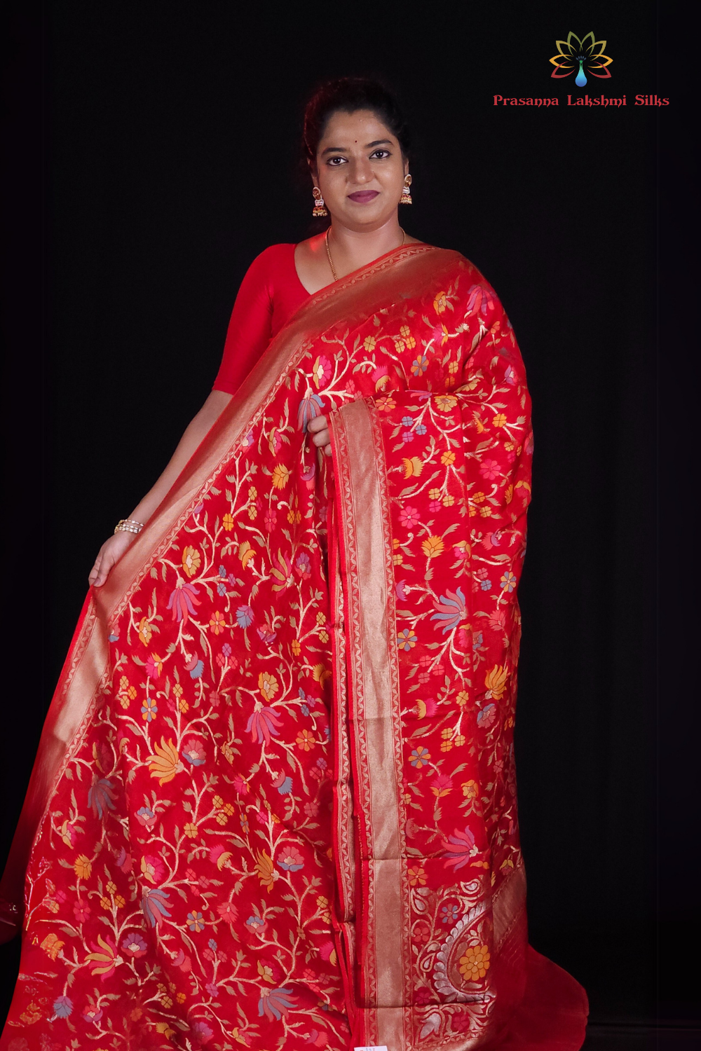“Elegant floral organza saree with zari border”