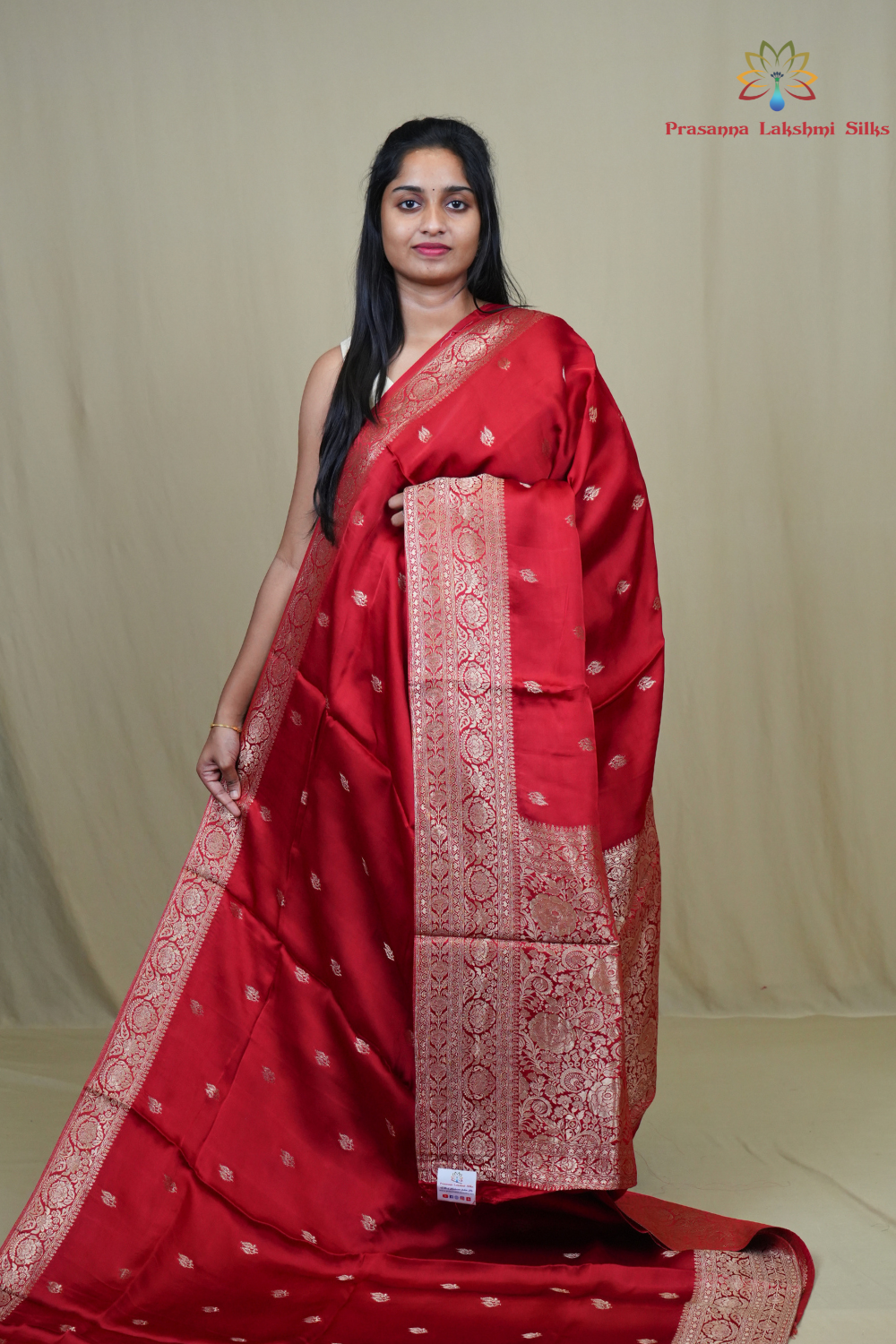 Banarasi Mashru saree with all-over tiny zari woven motifs and rich zari borders and pallu
