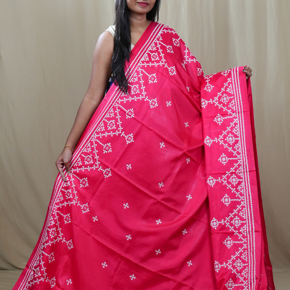 Traditional semi silk saree featuring beautiful hand Kutch work borders and artistic design.
