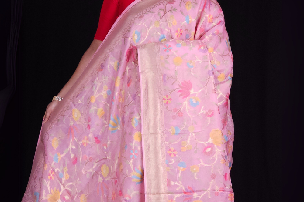 “Elegant floral organza saree with zari border”