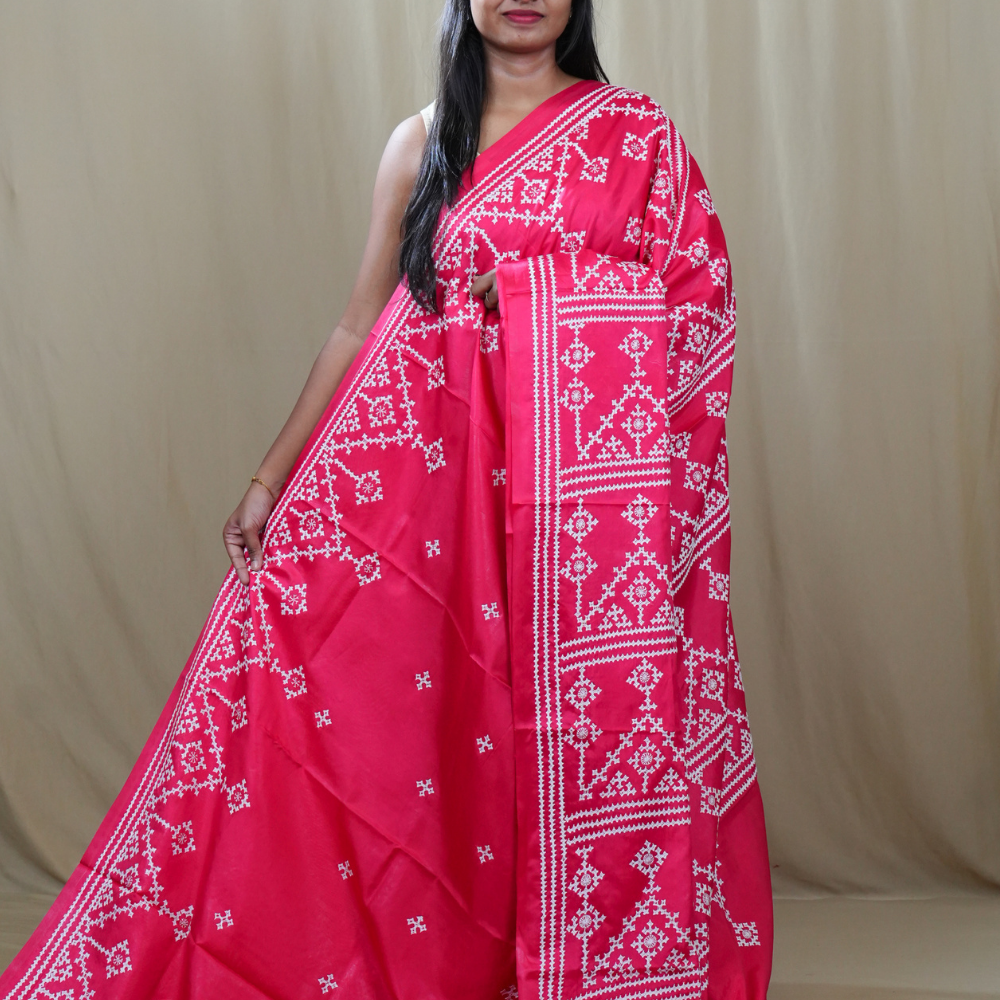 Semi Bangalore Silk Saree with all-over Kutch work motifs and rich embroidered pallu.
