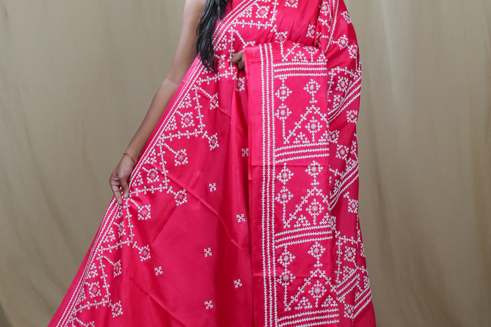 Semi Bangalore Silk Saree with all-over Kutch work motifs and rich embroidered pallu.
