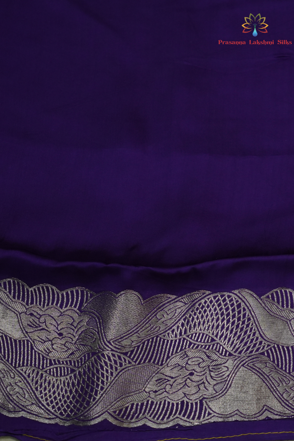 Festive Banarasi Mashru silk saree with intricate zari detailing and contrast blouse
