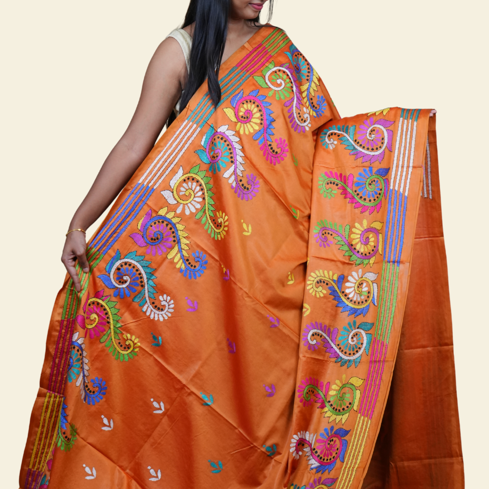 Elegant silk saree featuring Kantha work borders and detailed Kantha pallu design.