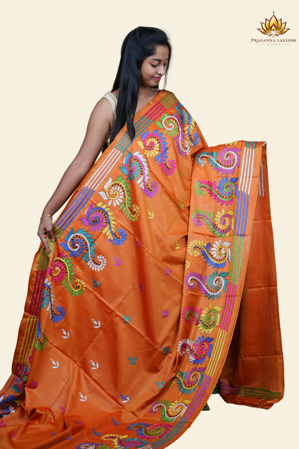 Elegant silk saree featuring Kantha work borders and detailed Kantha pallu design.