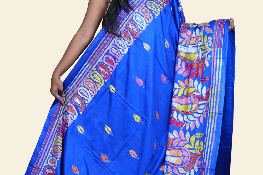 Elegant silk saree featuring Kantha work borders and detailed Kantha pallu design.
